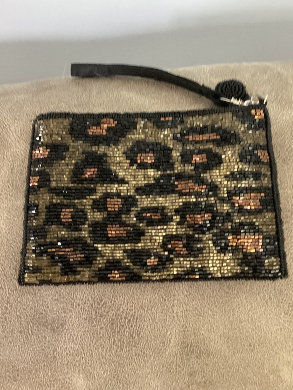 Shimmer beaded animal print wristlet new condition